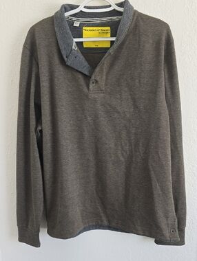Descendant of Thieves olive green long-sleeve polo shirt with a heather gray col